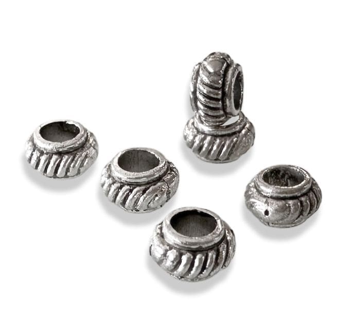 Perles charm's Intercalaire Toupie argentée 6mm x100 chez Arabesk
