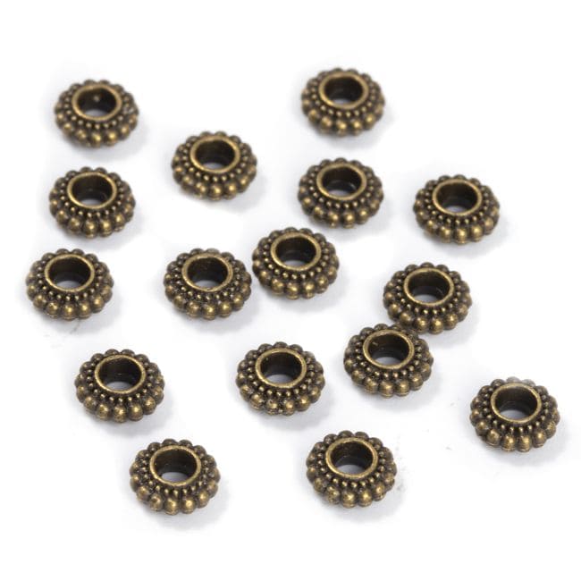 Perles Charms Intercalaire Rondelle Couleur Bronze 7mm x 100 chez Arabesk