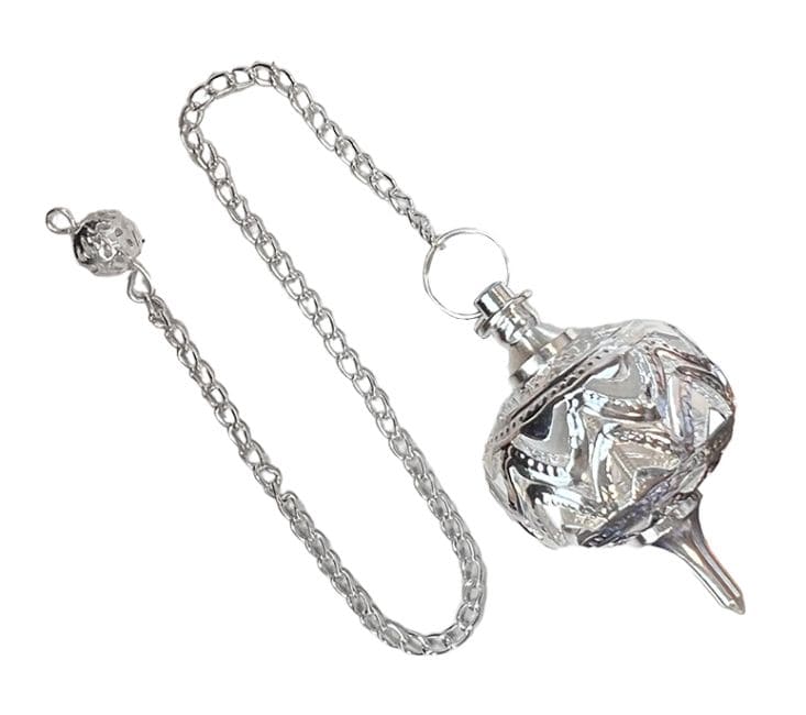 Pendule sphère  laiton argenté & métal ajouré chez Arabesk