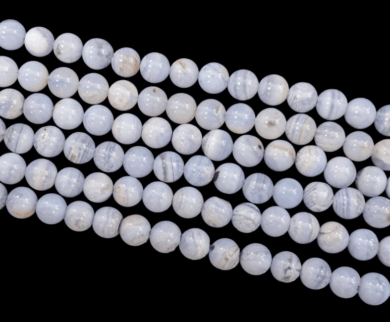 Perles Rondes sur Fil Calcédoine Bleue Rubanée A 6-7mm chez Arabesk