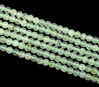 Prehnit A+ korálky 4.5mm na niti 40cm