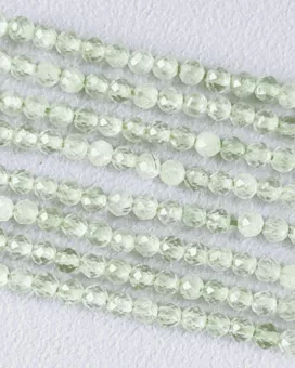 Prehnit Fasetovaný AA korálky 3mm na niti 40cm